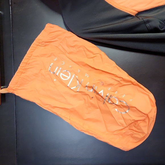 Calvin Klein Performance Jacket with bag Small - Picture 8 of 8